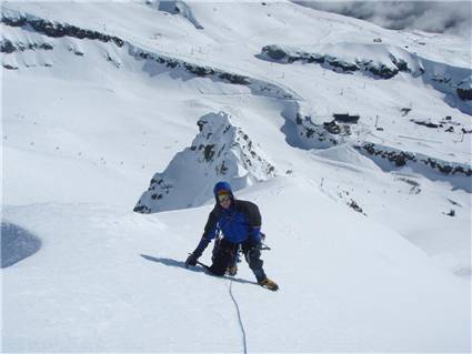 Simon climbing up the ridge to first pinnacle