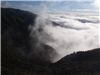 Mist swirls in the valleys