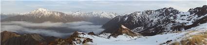 Saddle (right above tussock in foreground) and ridge to Adventure Bivouac