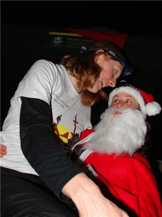 Hazel getting personal with the jolly old dude
