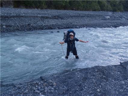 Some punter in a river...