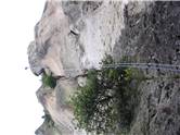 Guy abseiling off Tibia