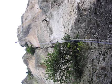 Guy abseiling off Tibia